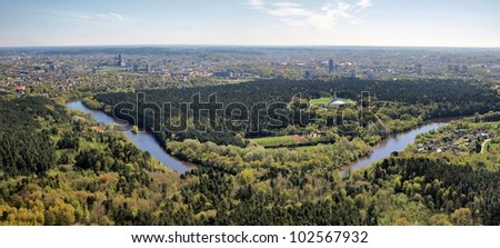 Vilnius city and nature with forests and Neris river.