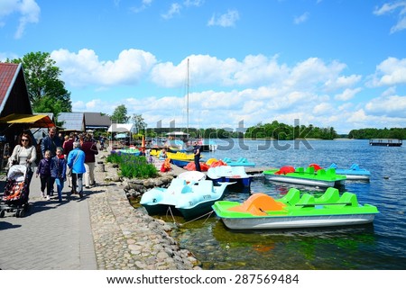 TRAKAI, LITHUANIA - MAY 31: Galves lake and boats in the lake view on May 31, 2015, Trakai, Lithuania.