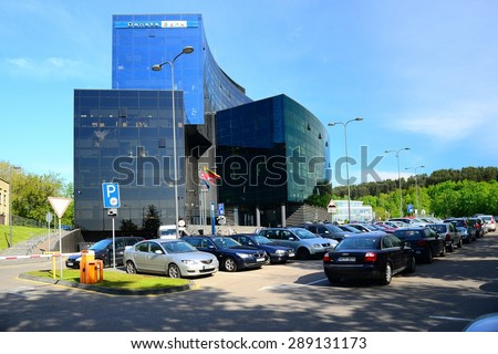 VILNIUS, LITHUANIA - MAY 12: Vilnius city street, cars and Danske Bank view on May 12, 2015, Vilnius, Lithuania.