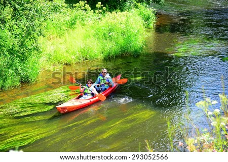 VILNIUS, LITHUANIA - JUNE 28: Canoes in River Vilnele near Entertainment and Recreation Center Belmontas on June 28, 2015, Vilnius, Lithuania.