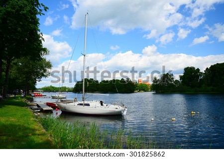 TRAKAI, LITHUANIA - MAY 31: Galves lake and boats in the lake view on May 31, 2015, Trakai, Lithuania.