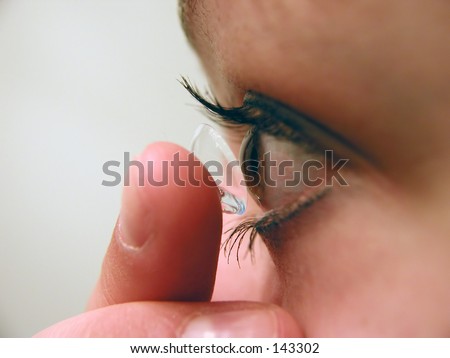 Inserting contact lens in eye