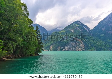 Amazing emerald green Vierwaldstatter lake (vierwaldstattersee) near Luzern city, Switzerland