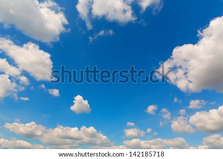 Clouds on the blue sky during sunny weather