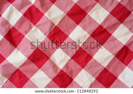 Abstract Background Texture Of A Red And White Checkered Picnic Blanket