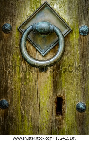 Handle And Keyhole Of Closed And Locked Ancient Wooden Church Door