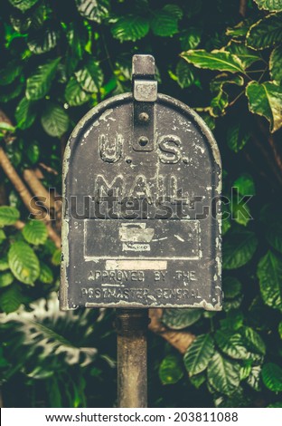 Retro Style Vintage US Mail Post Box Against Lush Tropical Background In Hawaii