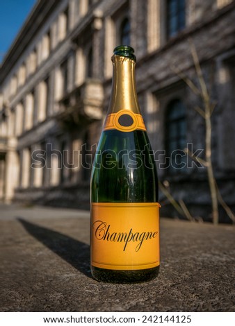 An Empty Bottle Of Champayne In The Street The Morning After A New Year\'s Party