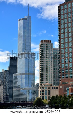 CHICAGO, USA - OCTOBER 6: Trump International Hotel and other city buildings beside Chicago river in downtown of Chicago, Illinois, in October 6th, 2014.Chicago is the biggest city in North of USA.