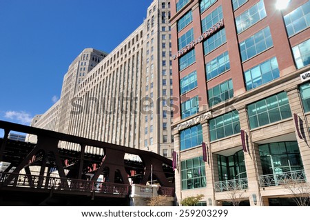 CHICAGO, USA - OCTOBER 6: City buildings and bridge beside Chicago river in downtown of Chicago, Illinois, in October 6th, 2014.Chicago is the biggest city in North of USA