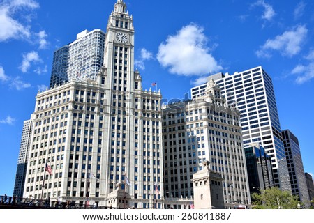 CHICAGO, USA - OCTOBER 6: Famous Wrigley Clock Tower beside Chicago river in downtown of Chicago, Illinois, in October 6th, 2014.Chicago is the biggest city in North of USA