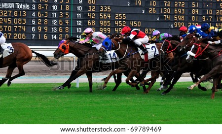 HONGKONG, CHINA - SEPT 26: Horse racing in Shatian racing field of Hongkong jockey club on September 26, 2009 in Hong Kong.