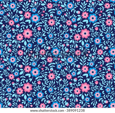 Cute pattern in small flower. Small colorful flowers. Blue background. Floral seamless pattern. Small cute simple spring flowers. Design concept for fashion textile print.