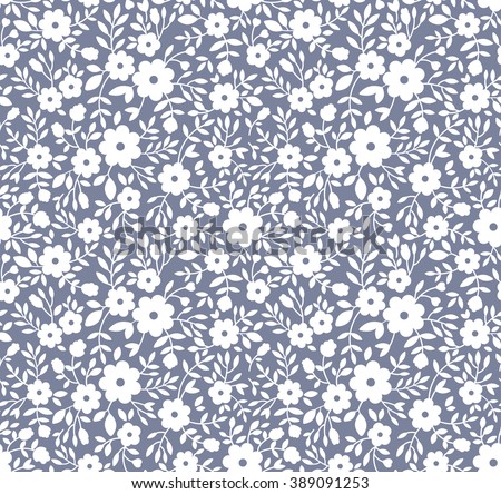 Cute pattern in small flower. Small white flowers. Gray background. Floral seamless pattern. Small cute simple spring flowers.