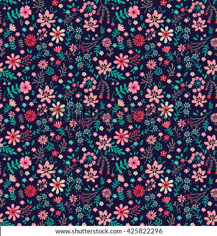 Cute pattern in small flower. Small pink flowers. Dark blue background. Ditsy floral background. The elegant the template for fashion prints.