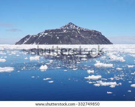 Antarctica blue iceberg landscape ocean mirrow reflection