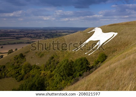A landscape view of the Westbury White Horse on the edge of Bratton Downs, Wiltshire, England