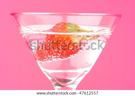 strawberry in martini glass