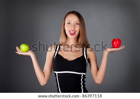 young woman with two apple