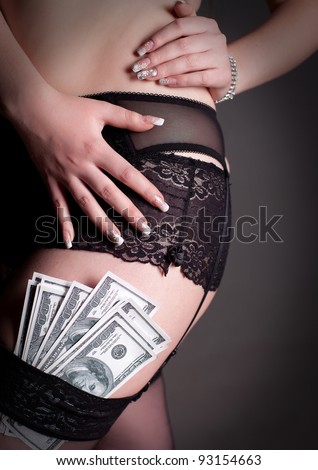 stock photo Sexy ass in black panties with money