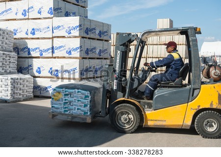 St. Petersburg, Russia-July 16, 2015: Warehouses building network of hypermarkets,  supervisors and drivers  are working in warehouses.