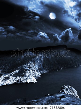moonlit night and clouds on night sky in the sea