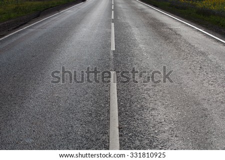 asphalt paving on highway turn close up