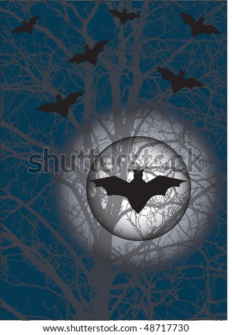 silhouette of flying bats and a full moon at night