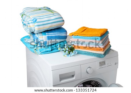 cleaning agents and cloths on a washing machine