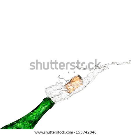 bottle of champagne popping its cork and splashing
