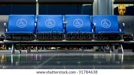 Empty Seats at Airport Gate