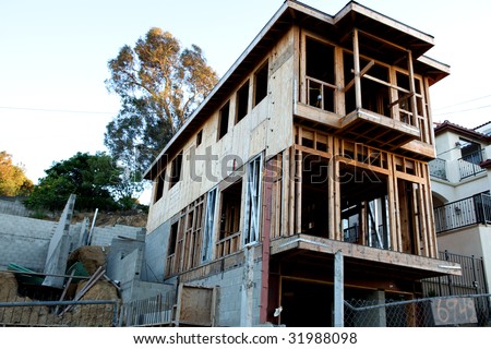 A house under construction from below with copy space
