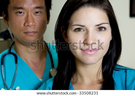 An asian and caucasian doctor team working