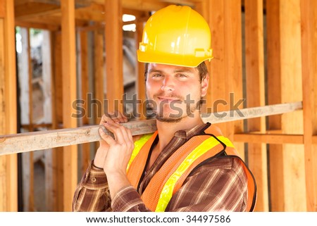 A closeup of a construction worker with a hard hat