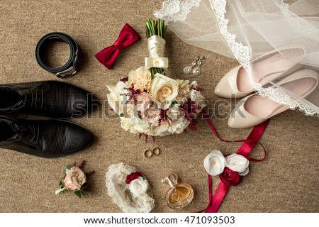 Wedding accessories. Bouquet and accessories of bride and groom. Wedding details