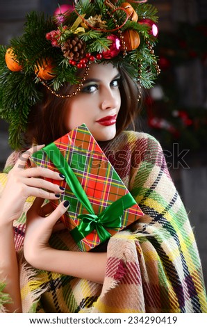 Christmas Woman.  New Year and Christmas Holiday Hairstyle and Make up