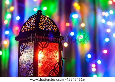 Arabic lantern on colorful light background. Ramadan, Eid concept