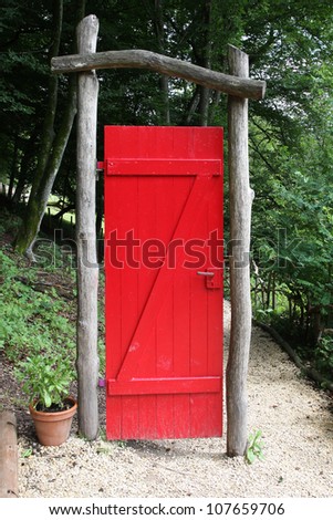 red door in a forest