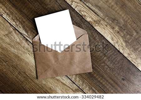 greeting card. empty blank card and envelope on old wooden background
