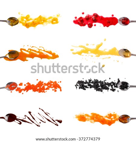 Set of 8 sauces and toppings isolated on white. spoons dipped in the sauces. marmalade, raspberry, apricot jam. Maple syrup, honey, red and black caviar, chocolate. Set for pancakes, waffles, crepes.