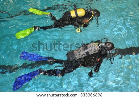 Two divers are training