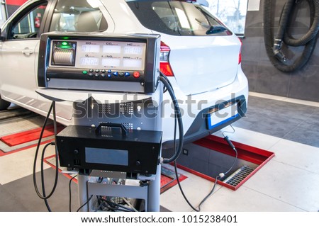 car diagnostic / exhaust gas measurement at a diagnostic station in a passenger car