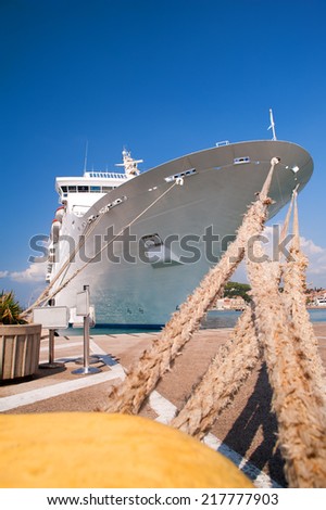 cruise ship moored in the harbor, ready to accept travelers on board