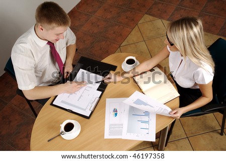 Meeting On Business. Documents on the table. Business call Team work to late hours.