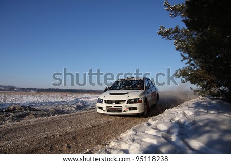 UTENA, LITHUANIA - JANUARY 28: Automotoprojektai rally team Mitsubishi Lancer car during \