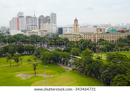 Manila, Philippines - JULY 14, 2015: Manila skyline with a view of the Manila City Hall, located in the historical center of Ermita