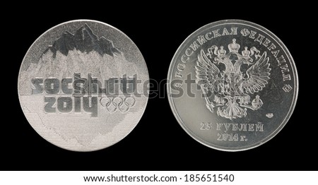 SOCHI, RUSSIAN FEDERATION - FEBRUARY 07, 2014: Twenty five rubles olympic coins, isolated on a black background.