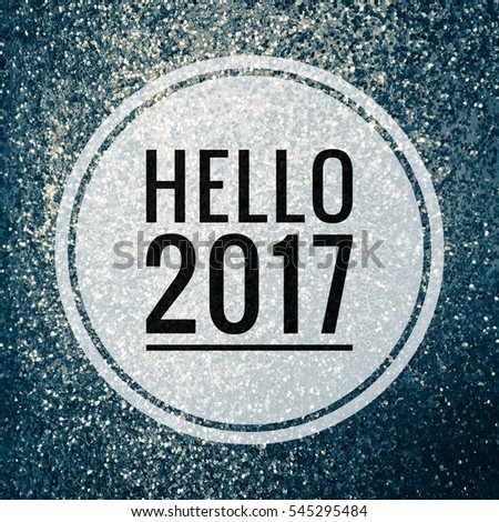 Welcome 2017 words on shiny blue glitter background