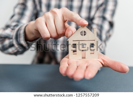 Real estate concept. Buying and selling homes. Mortgage and payment of taxes. Debt and loan. Purchase. Home sold. Realtor and Real Estate Agent Services. Rent apartment. Sale of property.