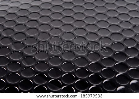 black circle textured background